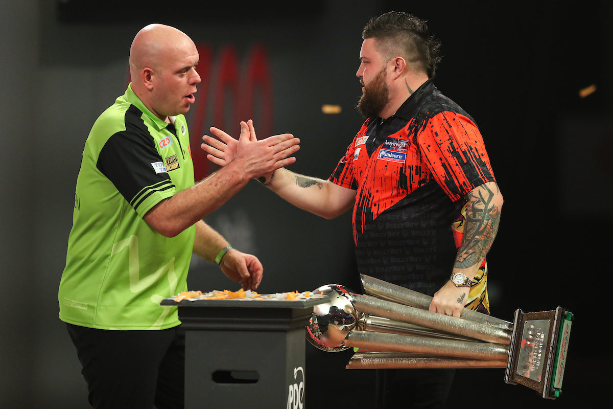 Nine-dart Smith stuns Van Gerwen to become World Champion