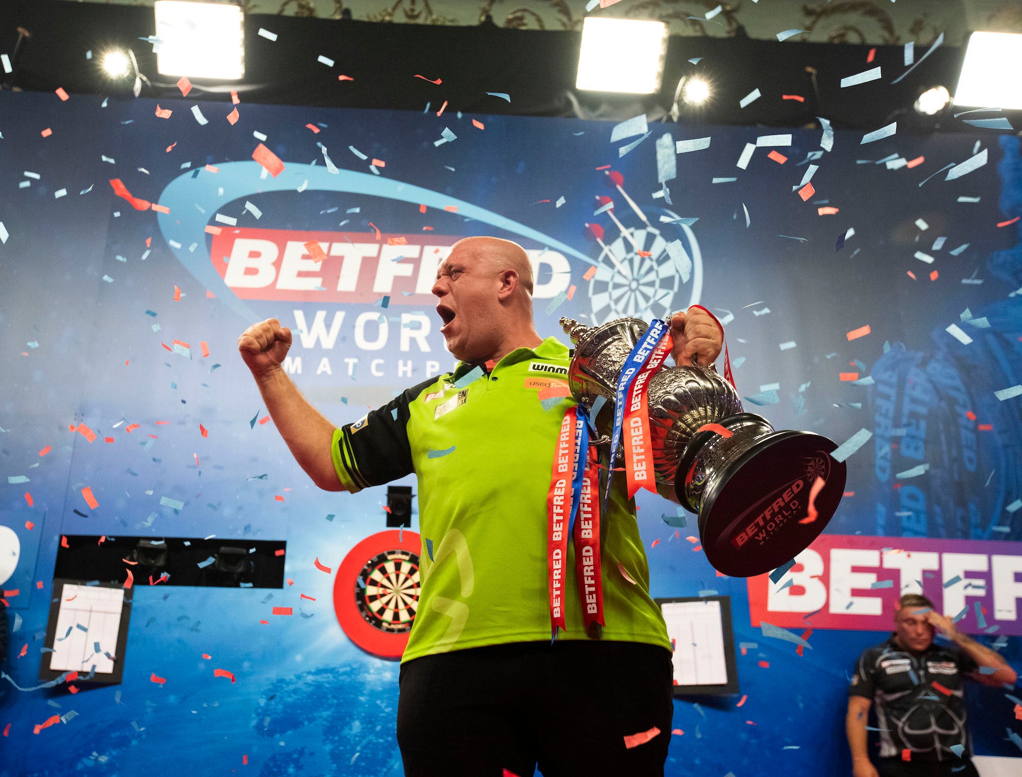 Van Gerwen to begin title defence against Dolan